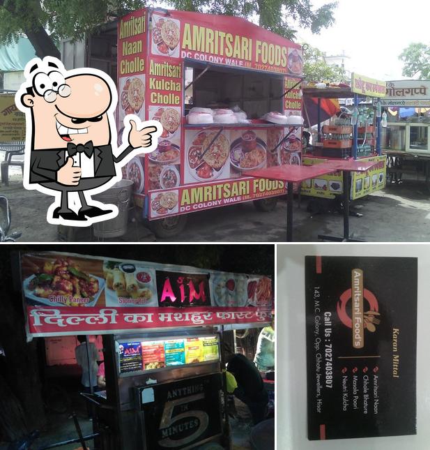 Look at the photo of STREET FOOD HAWKERS