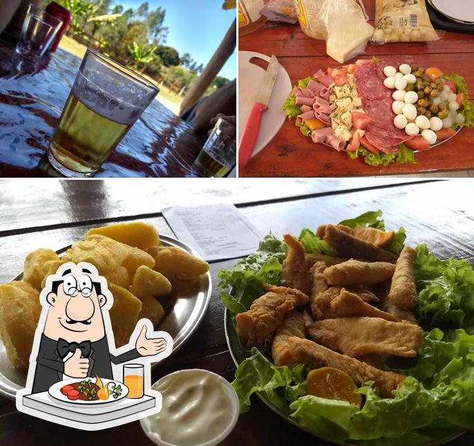 A imagem do Pesqueiro Payol’s comida e cerveja