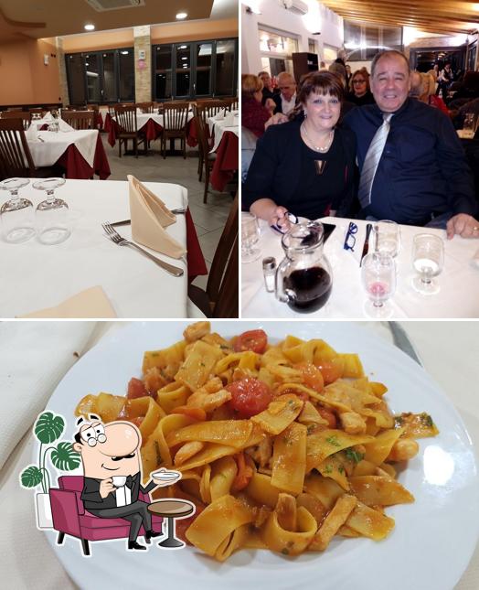 La immagine di interni e cibo da Ristorante Pizzeria Santo Stefano 2