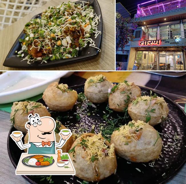 Check out the image depicting food and interior at Toran Restaurant