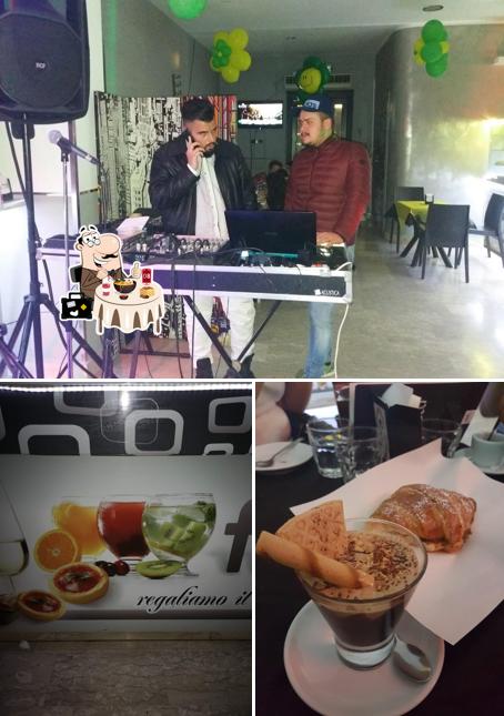 Questa è la immagine che mostra la cibo e interni di Free Bar