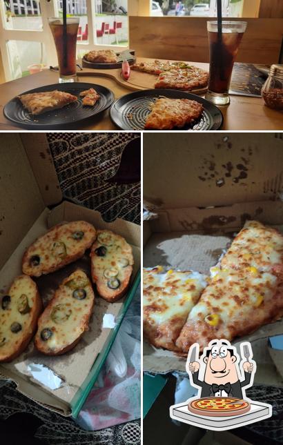 Pick pizza at The Pizza Slice