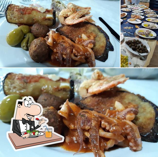 La foto di cibo e tavolo da pranzo da Ristorante La Lampara