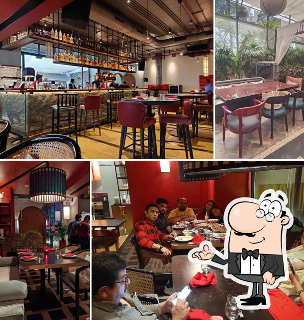 Take a seat at one of the tables at Foo Andheri