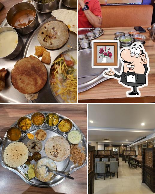 Among various things one can find interior and food at rangoli restaurant