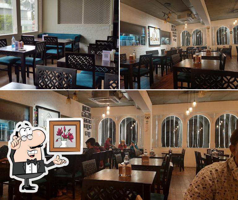 Take a seat at one of the tables at Rumi