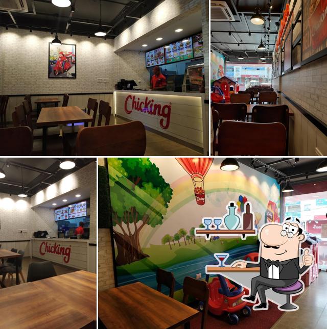 Take a seat at one of the tables at Chicking