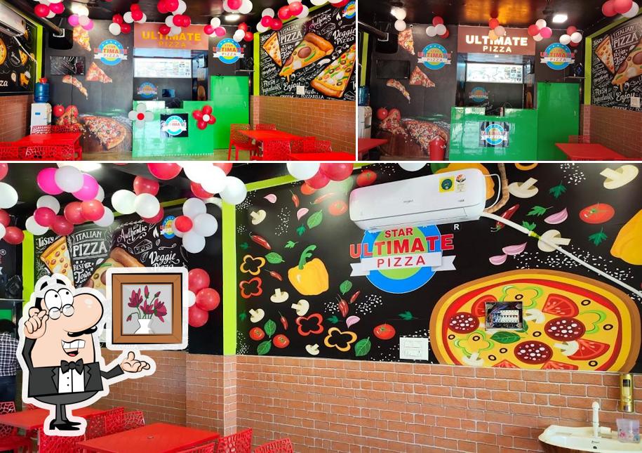 The interior of Star ultimate pizza family restaurant sikandra-bodla