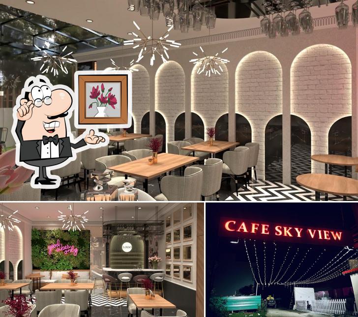 Take a seat at one of the tables at Cafe Sky View