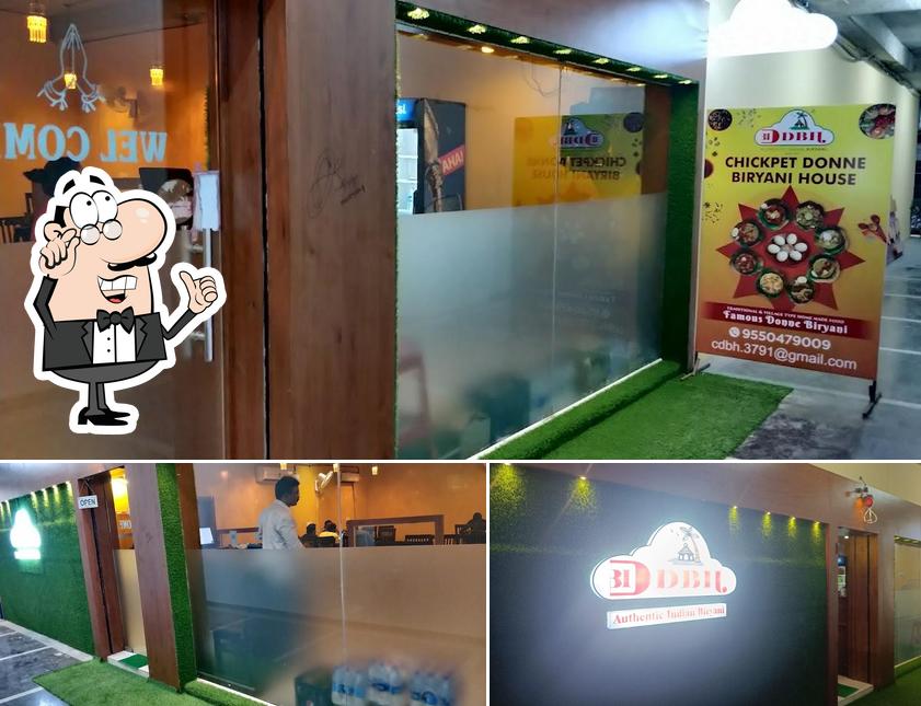 Take a seat at one of the tables at Chickpet Donne Biryani House Kondapur