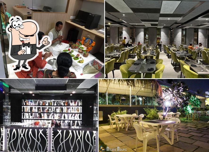 Take a seat at one of the tables at Moonlight Bar & Restaurant