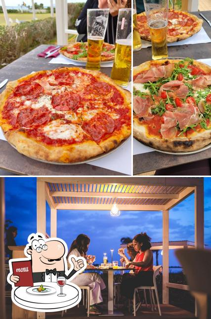 La immagine della cibo e interni di Pe'ahi Pizzeria