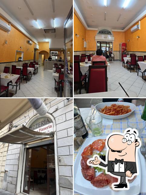 Gli interni di Ristorante e Pizzeria ''SAPORI DI ROMA''