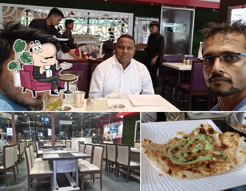 Take a look at the picture showing interior and food at Sankalp, Saffron, and Sam's Pizza Restaurant
