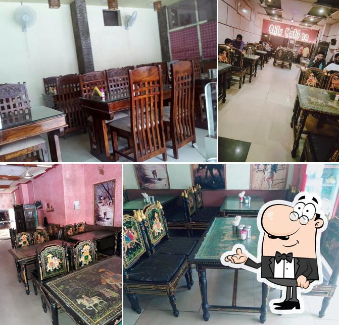 Take a seat at one of the tables at Shiv Mahima
