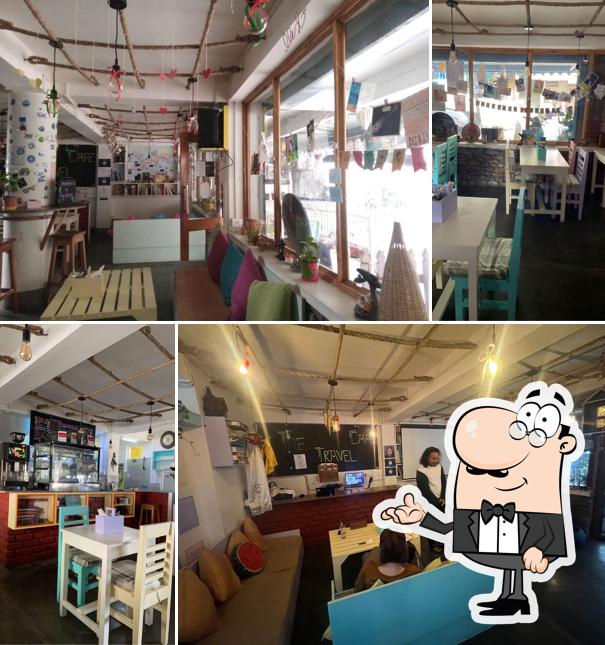 Take a seat at one of the tables at The Travel Cafe Gangtok