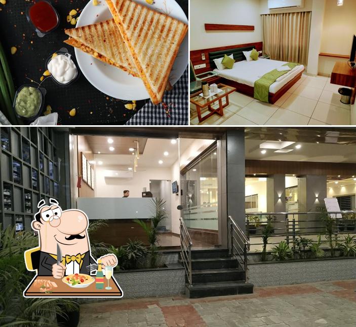This is the image displaying food and interior at Hotel Satkar Chhatral