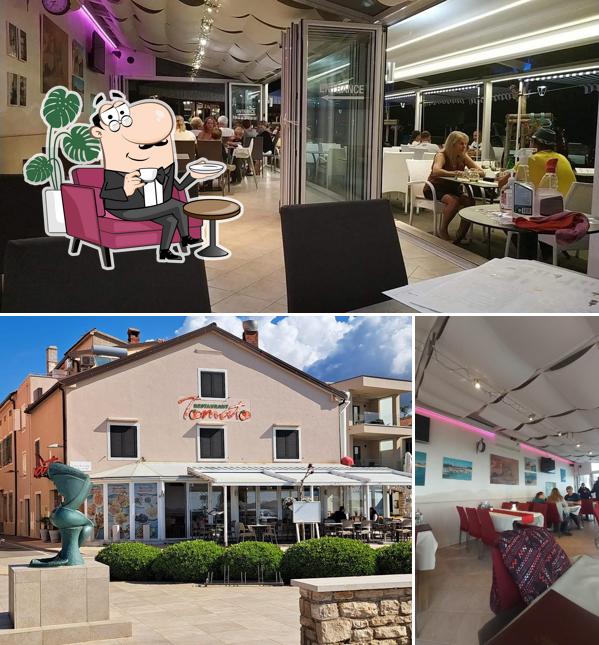 Gli interni di Restoran Tomato