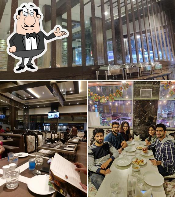 The interior of Pranaam Fine Dine Bar & Banquets