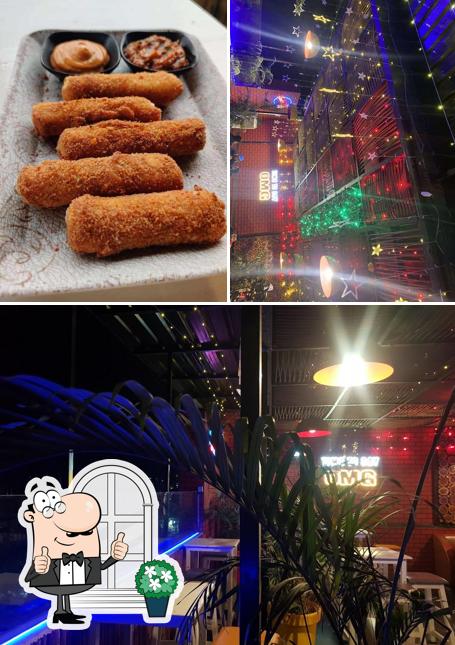 The photo of exterior and food at Pop’s Burger