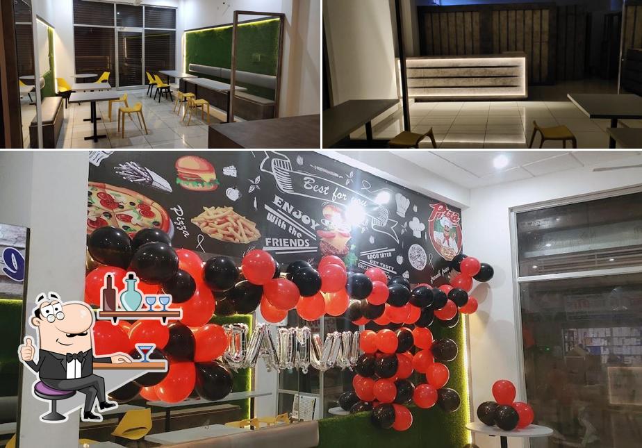 Take a look at the picture showing interior and food at CRISPY CAFE