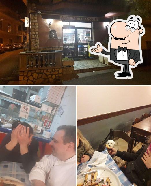 Dai un'occhiata agli interni di All'Angolo