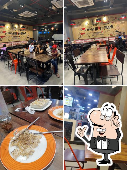 The interior of Pizza Hut Malkajgiri, Hyderabad