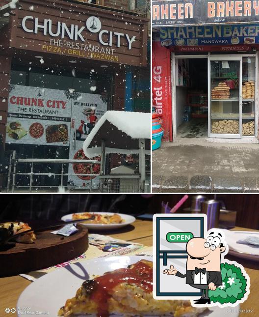 Check out the picture displaying exterior and dining table at Chunk City The Restaurant