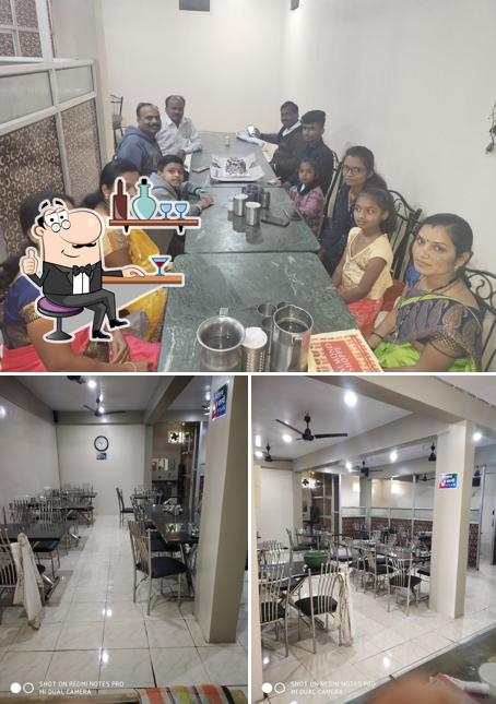 Take a seat at one of the tables at Gajanan Bhojanalay