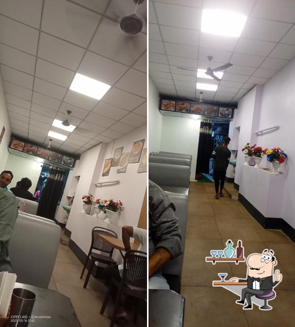 Take a seat at one of the tables at SAFFRON HYDERABADI DUM BIRYANI