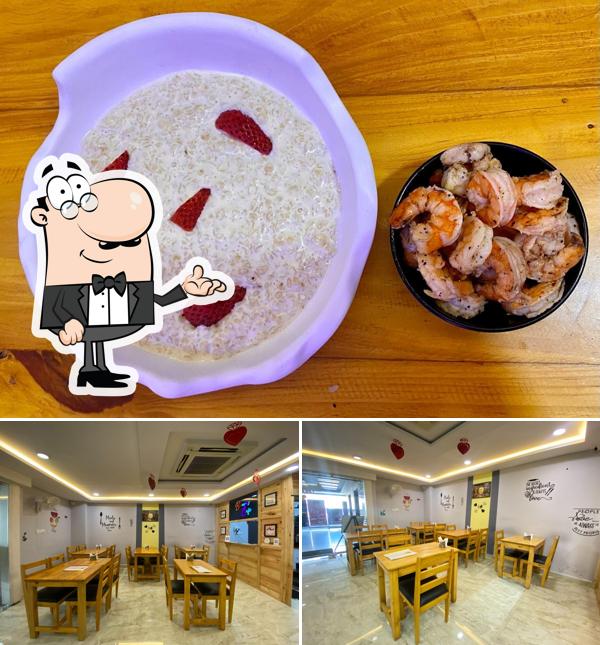 This is the image depicting interior and food at Bhavi’s Café