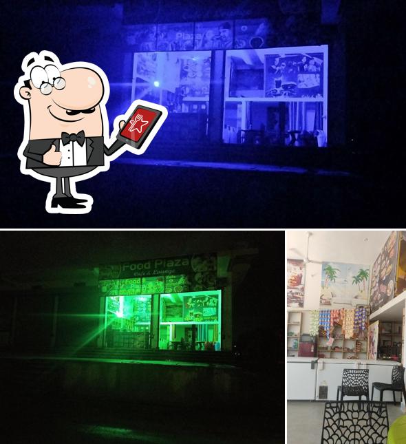 This is the picture displaying exterior and interior at Food plaza cafe and lounge