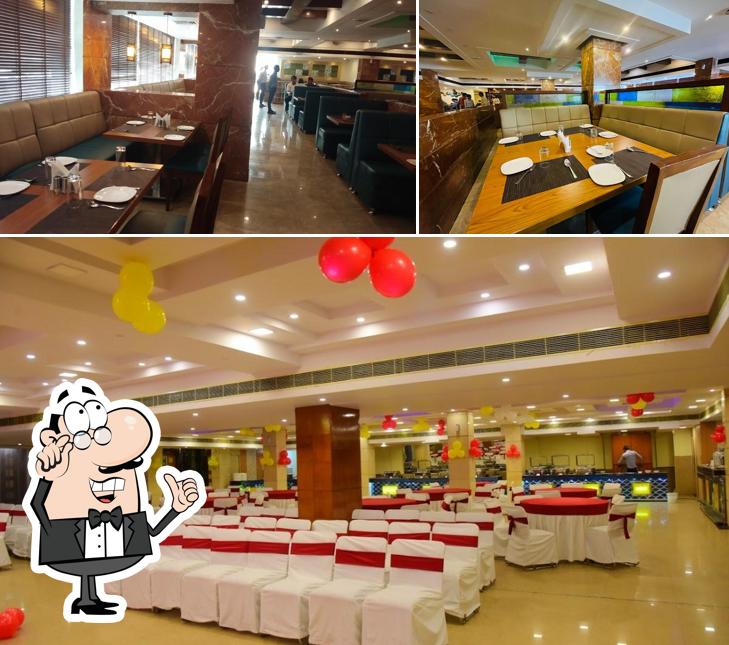 Take a seat at one of the tables at A Bleu Basil