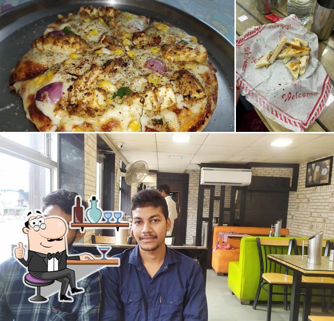 The photo of interior and food at Sharma Hotel