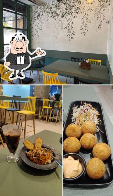 The photo of Basil - The Café’s interior and dessert