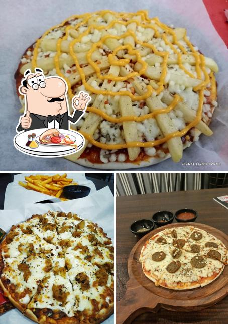 Try out pizza at Bite & Beans Cafe