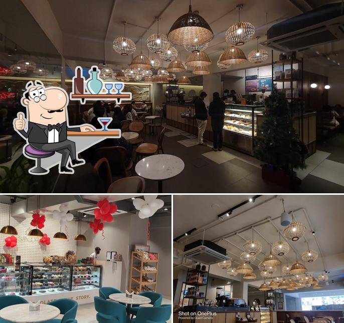 Take a seat at one of the tables at Third Wave Coffee