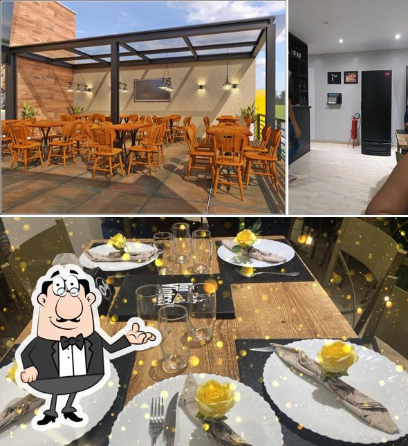 O interior do Pizzaria Don Vinicci