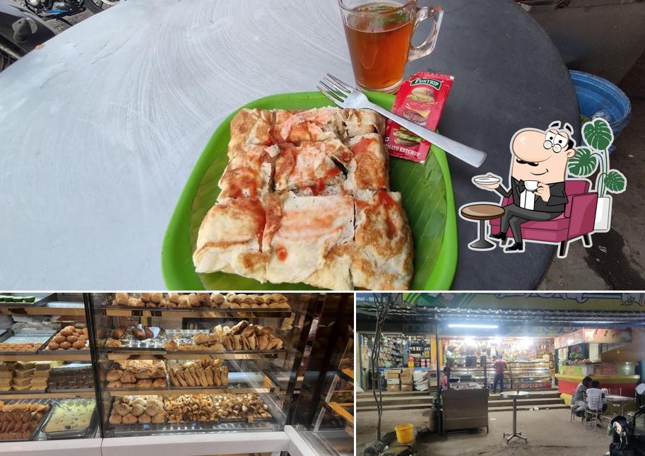Take a look at the image depicting interior and food at Selvam Bakery & Sweets