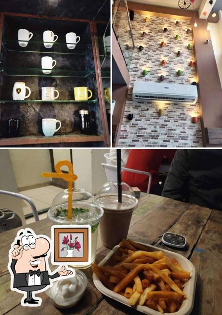 Take a seat at one of the tables at Love over coffee