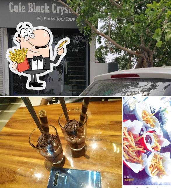 Order French fries at Cafe black crystal