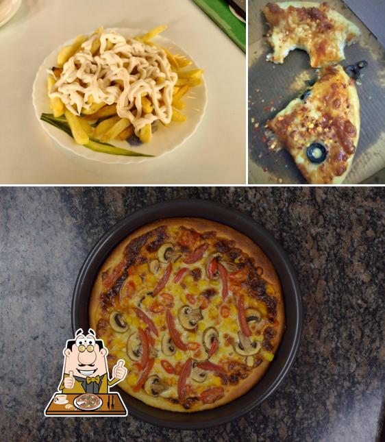 At Cheezy Pizza's & Burgers, you can enjoy pizza