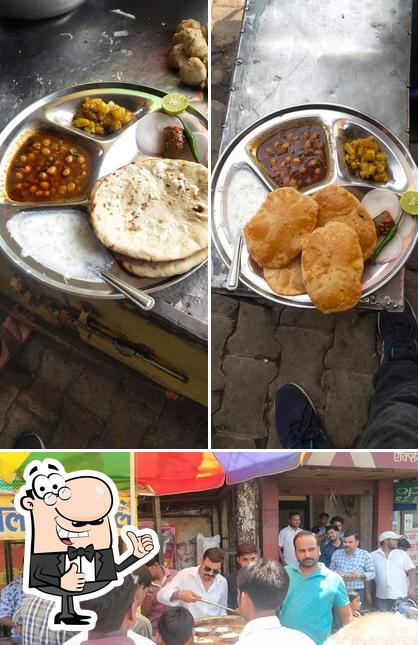 See this pic of Baba chola bhatura