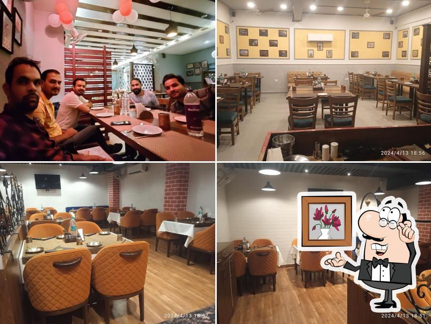 Take a seat at one of the tables at Shan-E-Pakwan