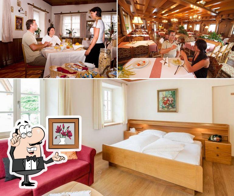Siediti a un tavolo di Albergo Ristorante Goldene Rose