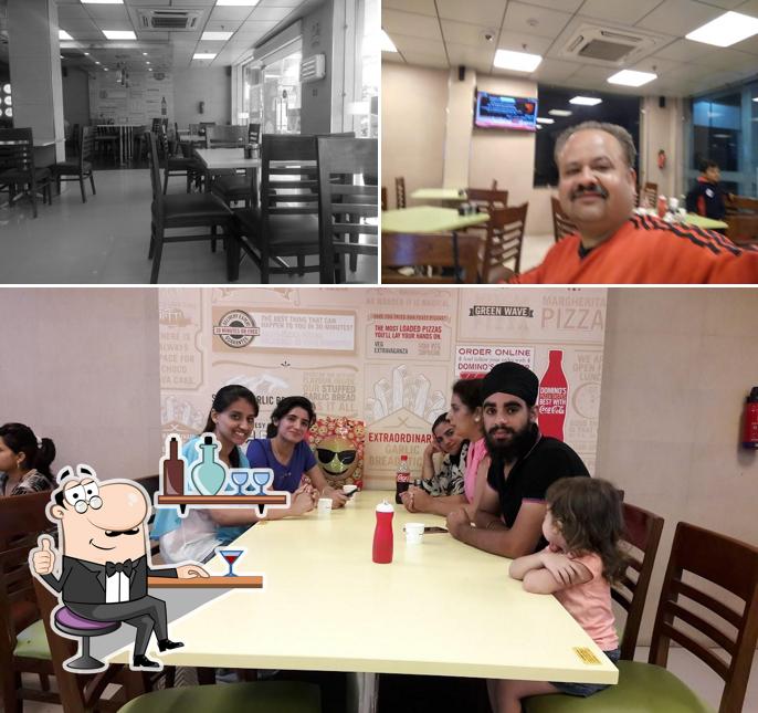 Take a seat at one of the tables at Domino's Pizza Batal