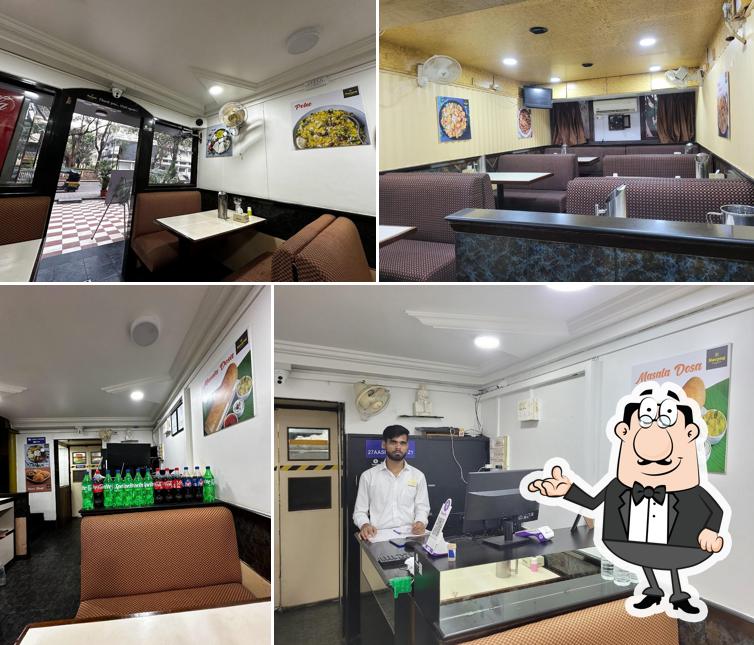 The interior of Navyug Pure Veg Restaurant