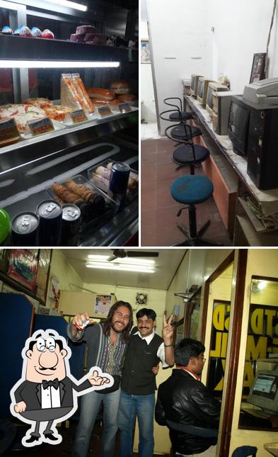 This is the image showing interior and dessert at Mewar Internet Cafe n Cafeteria