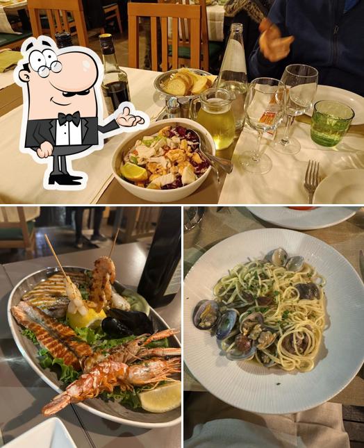 Tra le varie cose da Lo Smeraldo - Ristorante Pizzeria si possono trovare la interni e cibo