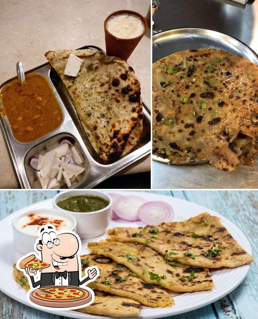 Try out pizza at Delhi Special Paranthe Wali Gali